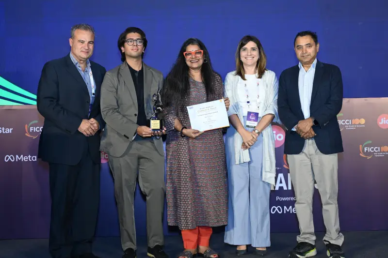 A winning team with their trophy and certificate at the FICCI BAF Awards 2026.